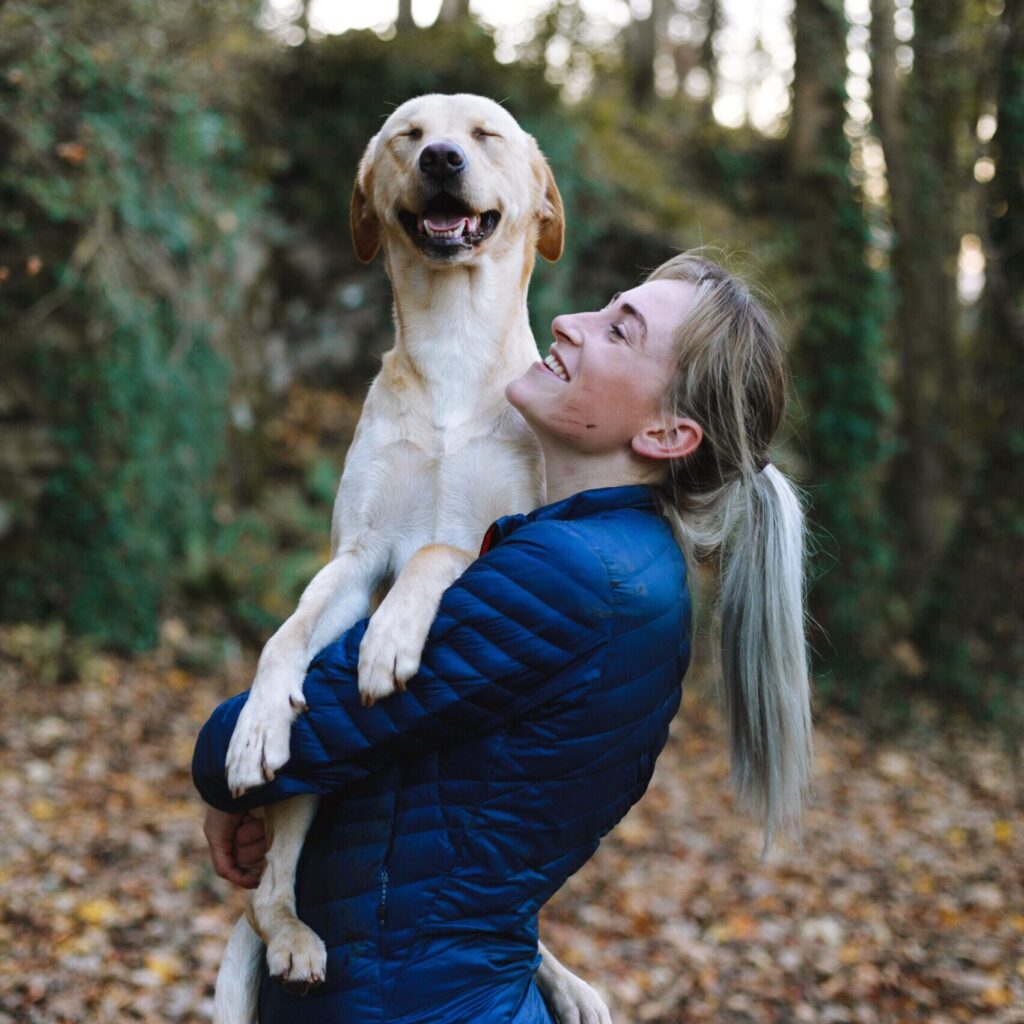 Woman talking her dog for a walk